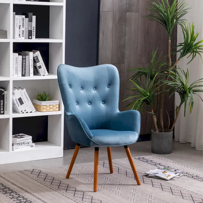 Fauteuil d'appoint capitonné en velours bleu avec pieds en bois massif