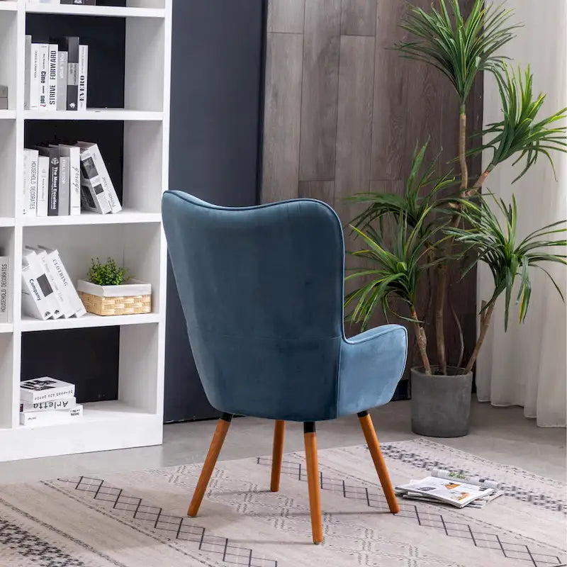 Fauteuil d'appoint capitonné en velours bleu avec pieds en bois massif