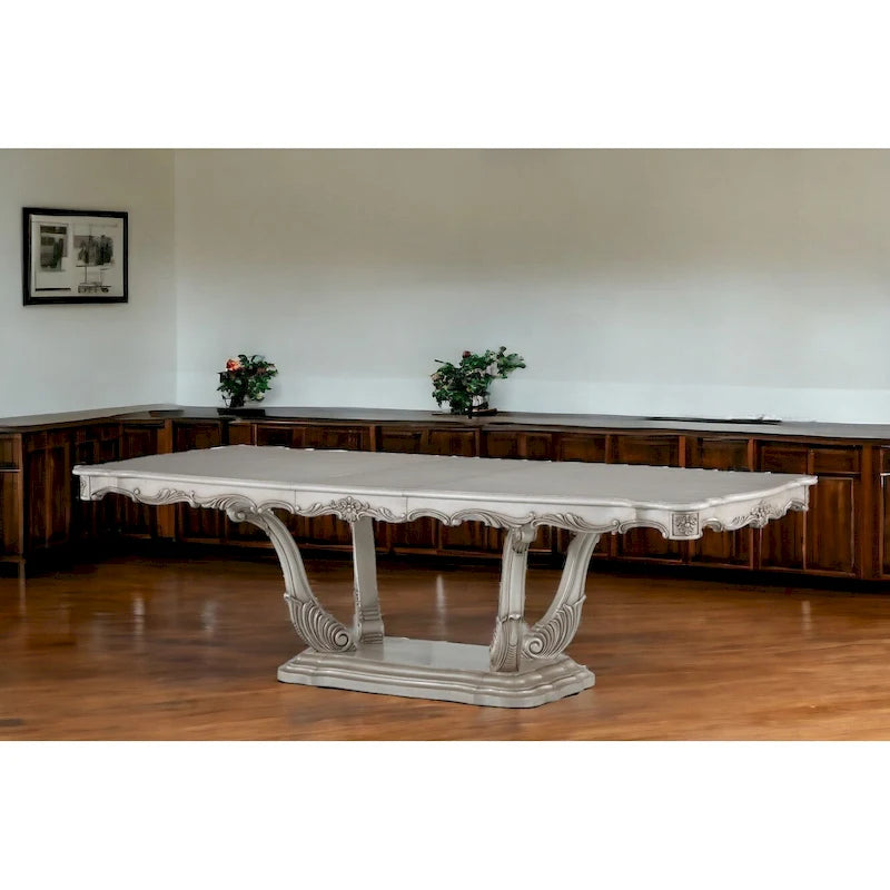 Table de salle à manger classique à piédestal rectangulaire en bois massif blanc cassé orné