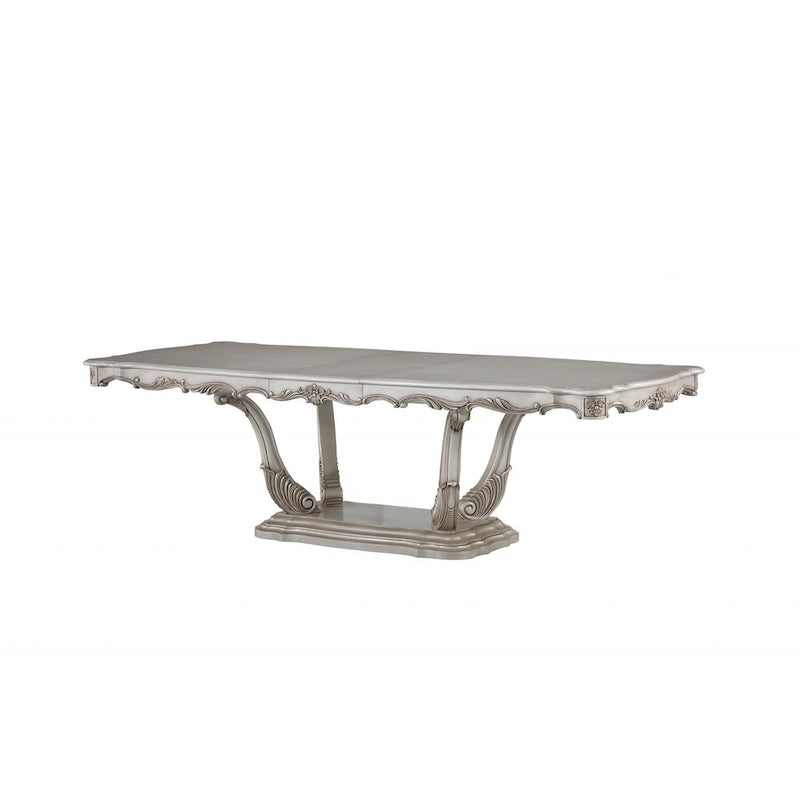 Table de salle à manger classique à piédestal rectangulaire en bois massif blanc cassé orné